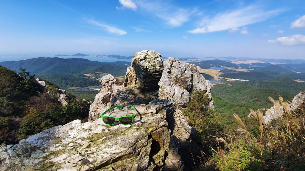 Green sunglasses on a rock at Dosolam Hermitage near Haenam, South Korea