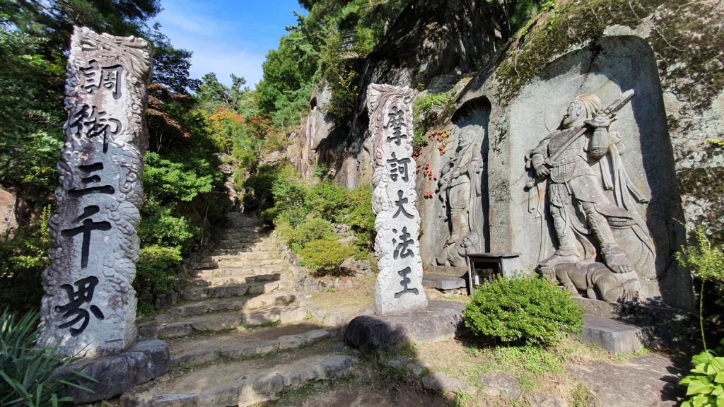 Entrance with rock-carved guardians to Seoamjeongsa Temple in Jirisan National Park, South Korea