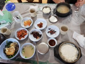 Sundubu (soft tofu soup) and mountain vegetable bibimbap meal in Sokcho