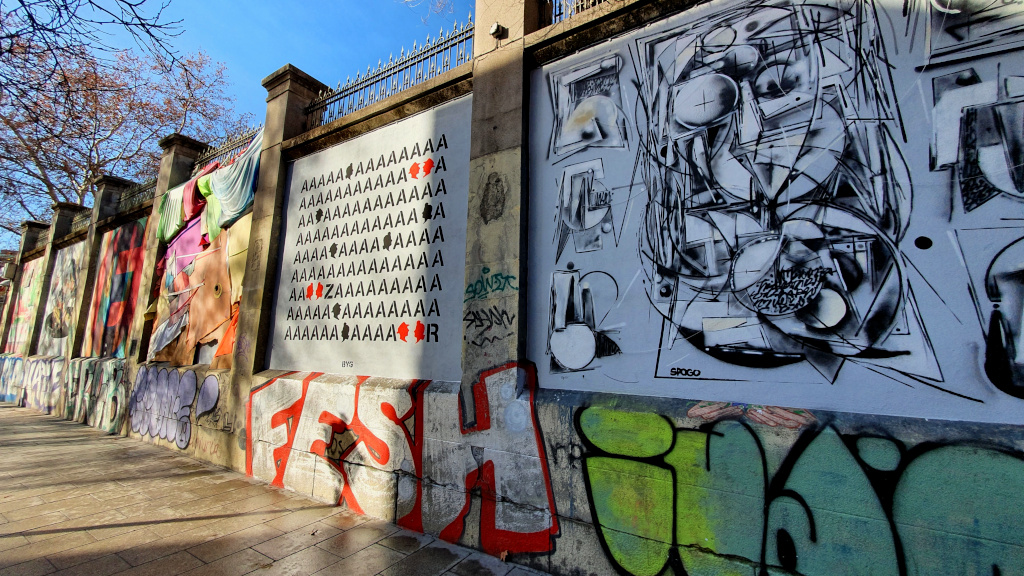 Street art at Calle de Miguel Servet behind Tabacalera in Madrid, Spain